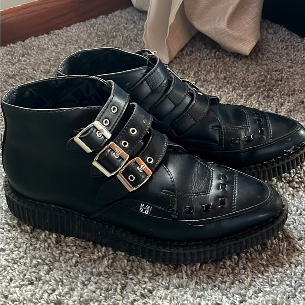 Black  T.U.K Triple buckle leather shoes.
